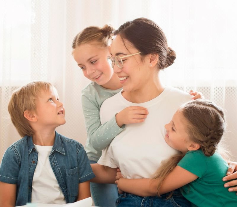 a nanny babysitting 3 babies