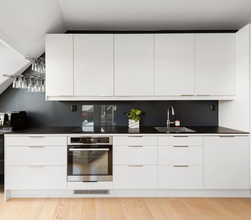 organized wooden cabinet in kitchen